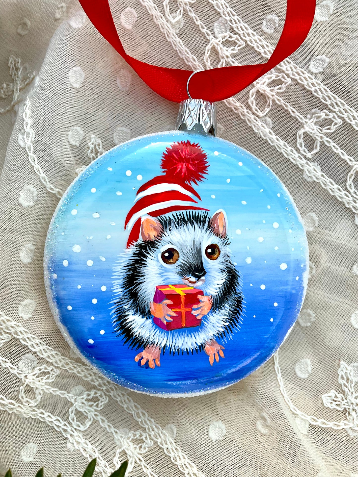 Hedgehog bringing gift